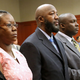 Trayvon's parents, who averted their eyes when the image of their son's dead body was shown during the trial (Getty Images)